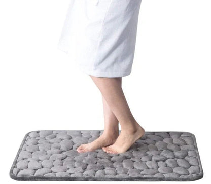 Sneldrogende badmat met antislip onderzijde en zachte textuur
