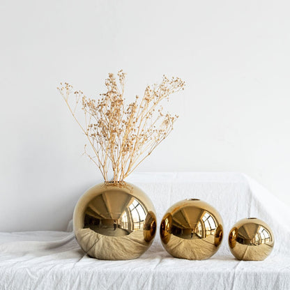 Gouden keramische bolvaas met glanzende afwerking