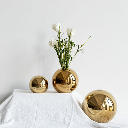 Gouden keramische bolvaas met glanzende afwerking