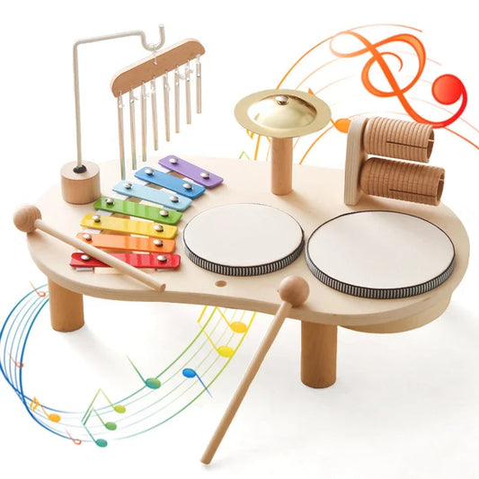 Houten muziekstation met xylofoon, trommel en maracas