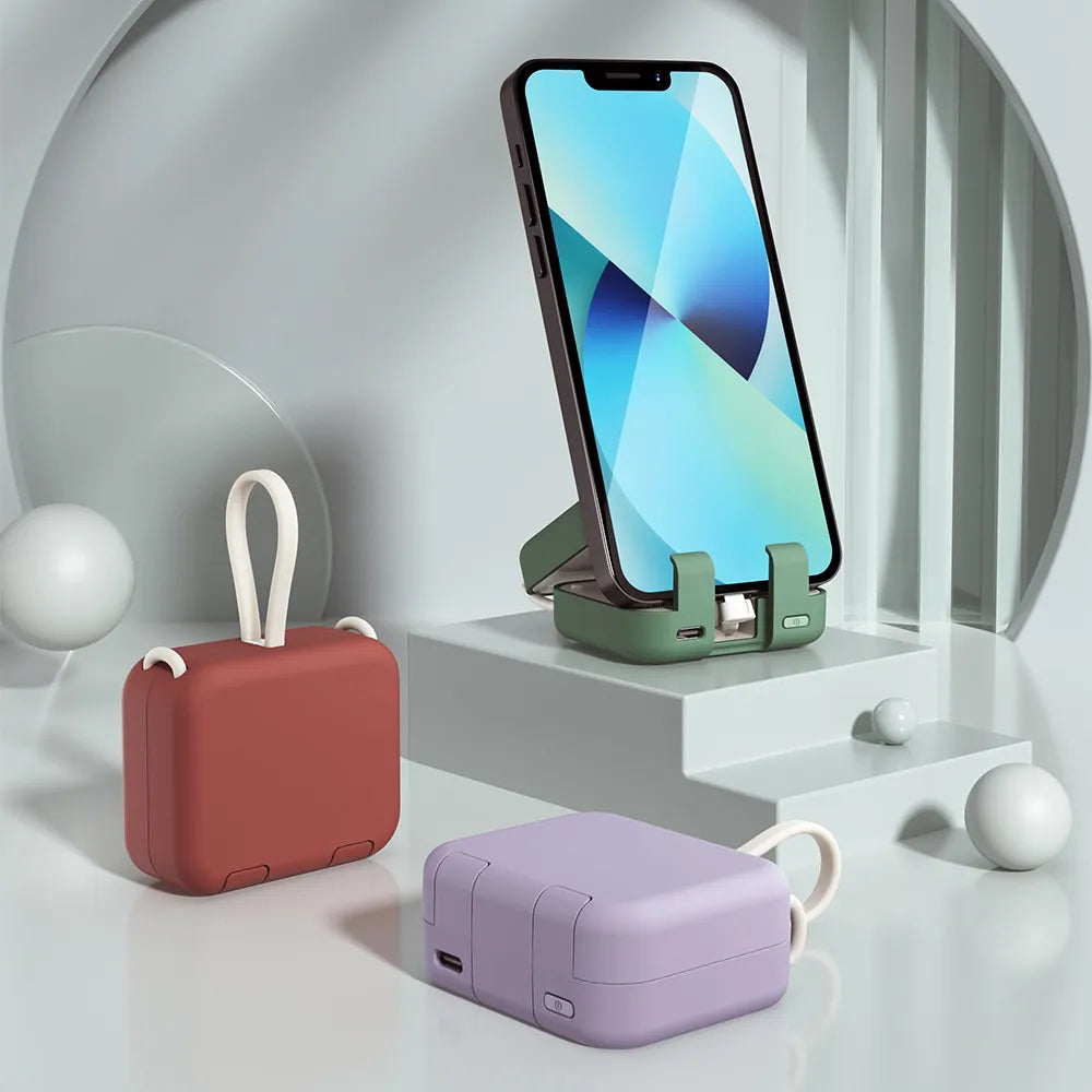 Compacte powerbank van 4000 mAh met ingebouwde kabels