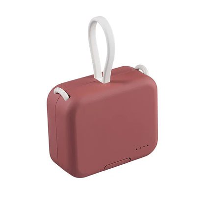 Compacte powerbank van 4000 mAh met ingebouwde kabels