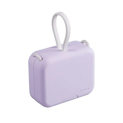 Compacte powerbank van 4000 mAh met ingebouwde kabels