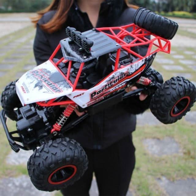 Op afstand bestuurbare 4x4 monstertruck met off-road banden