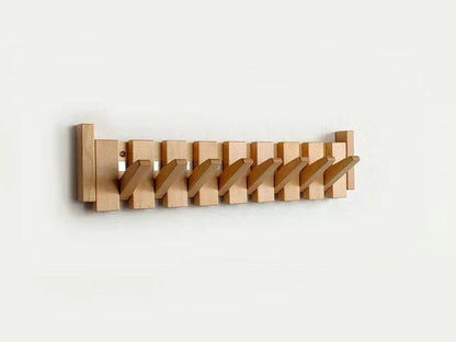 Houten wandkapstok met inklapbare magnetische haken