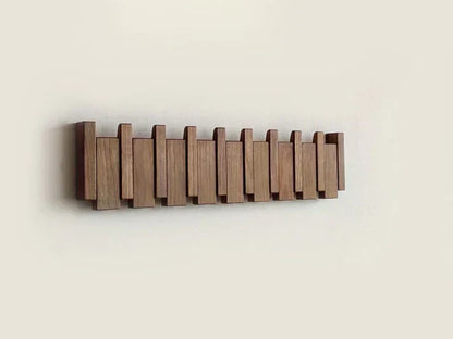 Houten wandkapstok met inklapbare magnetische haken