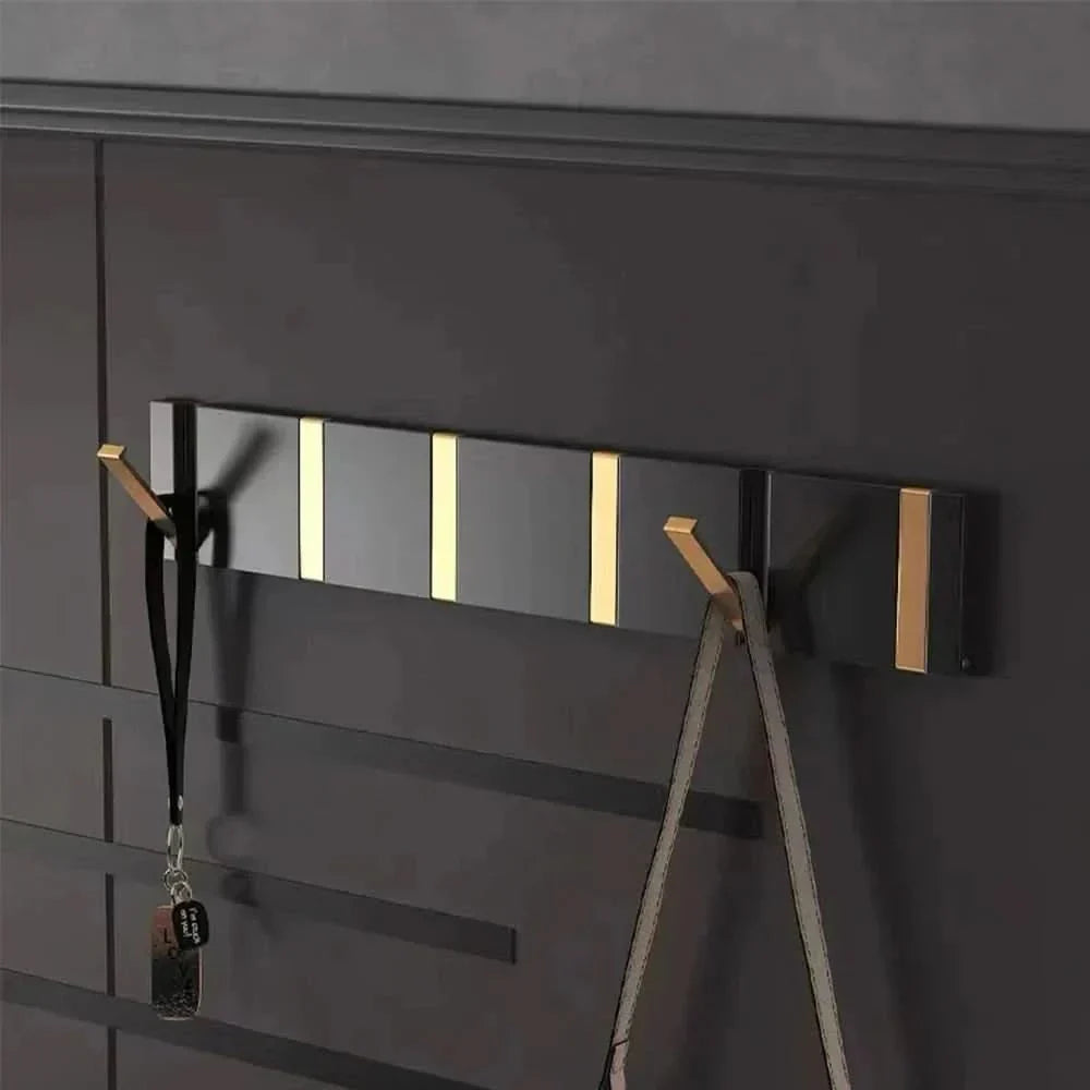 Inklapbare wandhaak met minimalistisch design