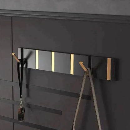 Inklapbare wandhaak met minimalistisch design