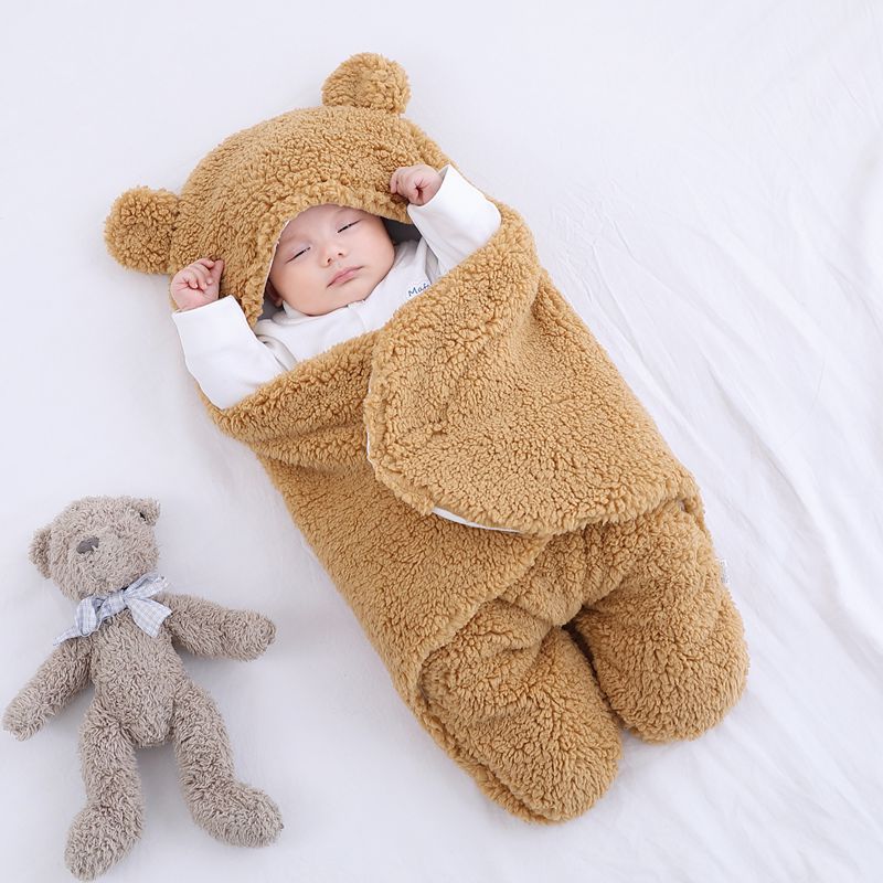 Ademende katoenen baby inbakerdoek met klittenbandsluiting
