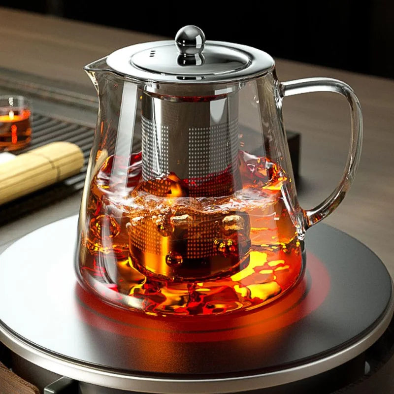 Glazen theepot met rvs theezeef en schenktuit