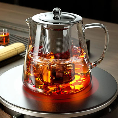 Glazen theepot met rvs theezeef en schenktuit