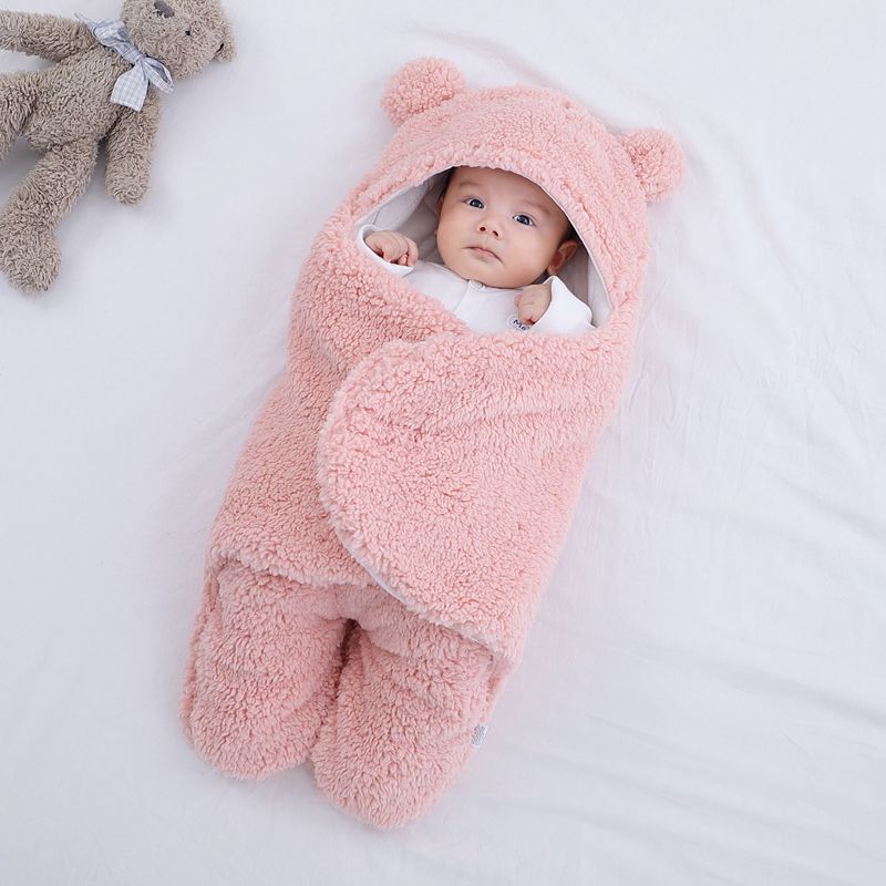 Ademende katoenen baby inbakerdoek met klittenbandsluiting