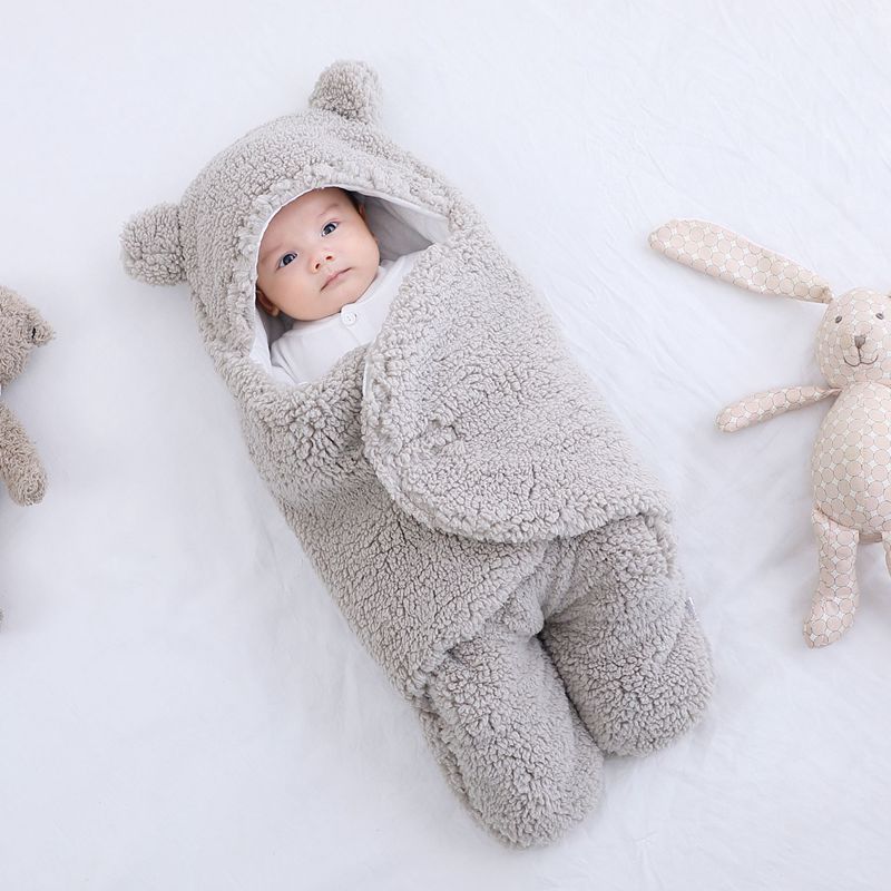 Ademende katoenen baby inbakerdoek met klittenbandsluiting