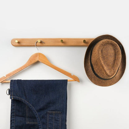 Houten wandkapstok met messing haken