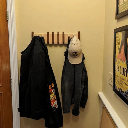 Houten wandkapstok met inklapbare magnetische haken