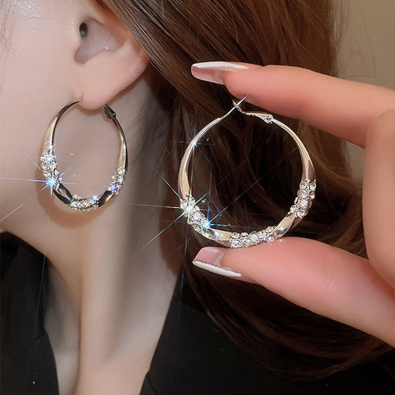 Cirkel oorbellen van 32 mm met zirkonia