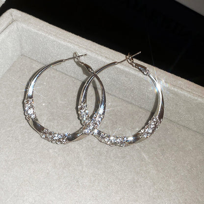 Cirkel oorbellen van 32 mm met zirkonia