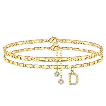 Gelaagde gouden enkelband met strass
