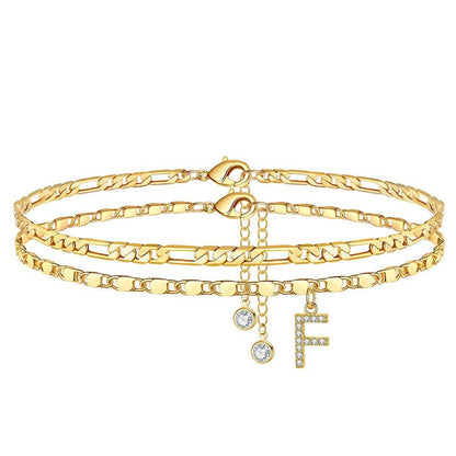 Gelaagde gouden enkelband met strass