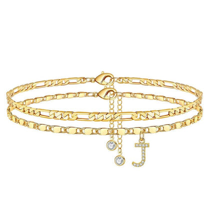 Gelaagde gouden enkelband met strass