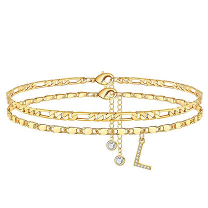 Gelaagde gouden enkelband met strass