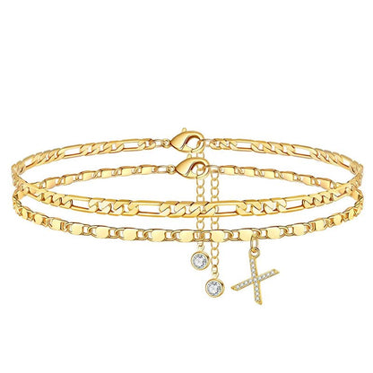 Gelaagde gouden enkelband met strass