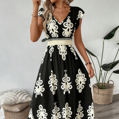 Maxi damesjurk met barokprint en V-hals