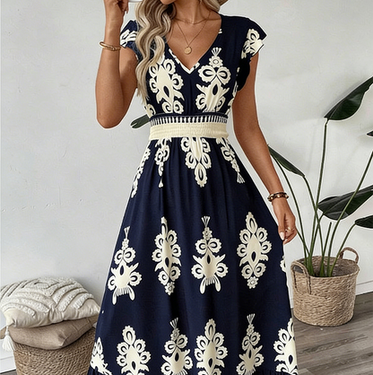 Maxi damesjurk met barokprint en V-hals