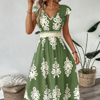 Maxi damesjurk met barokprint en V-hals