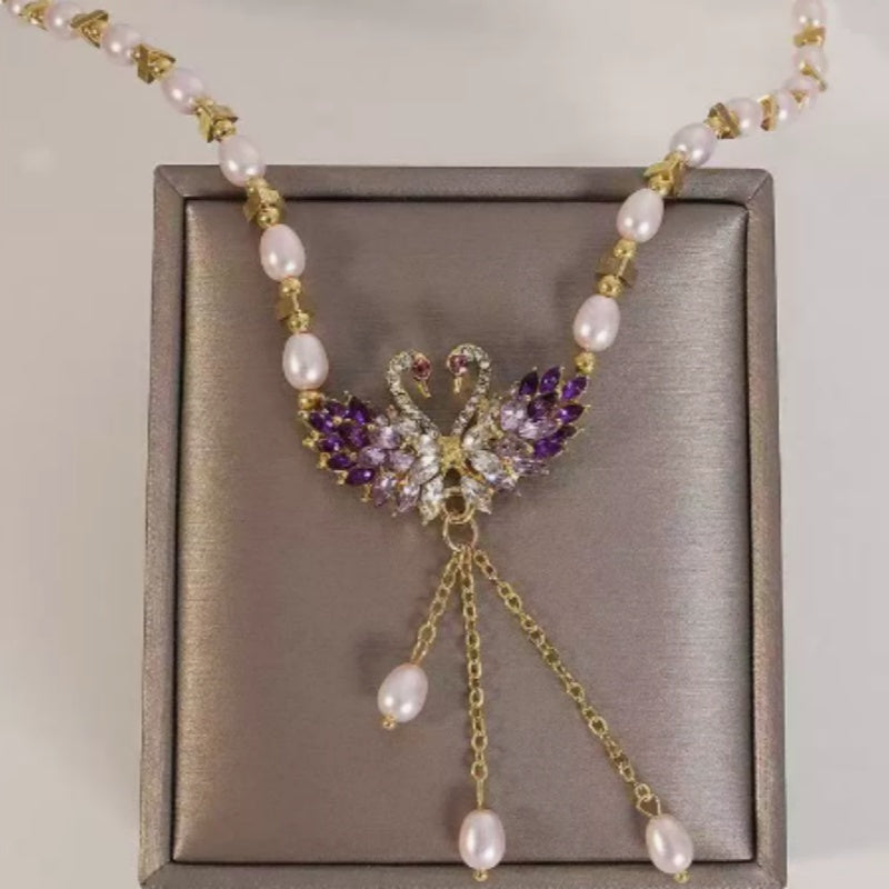 Paarse dubbele zwaan hanger ketting met fantasieparels
