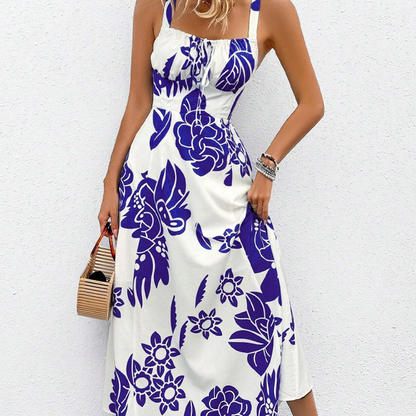 Luchtige dames zomerjurk met bloemenprint en spaghettibandjes