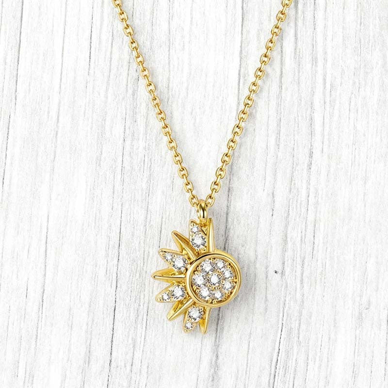 Tweekleurige zon- en maanhalsketting met strass steentjes