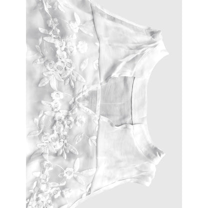 Mouwloze damesblouse met bloemenkant en V-hals