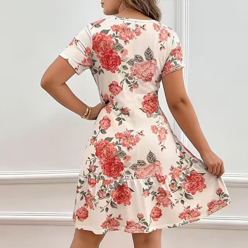Dames jurk met bloemenprint en ruches zoom