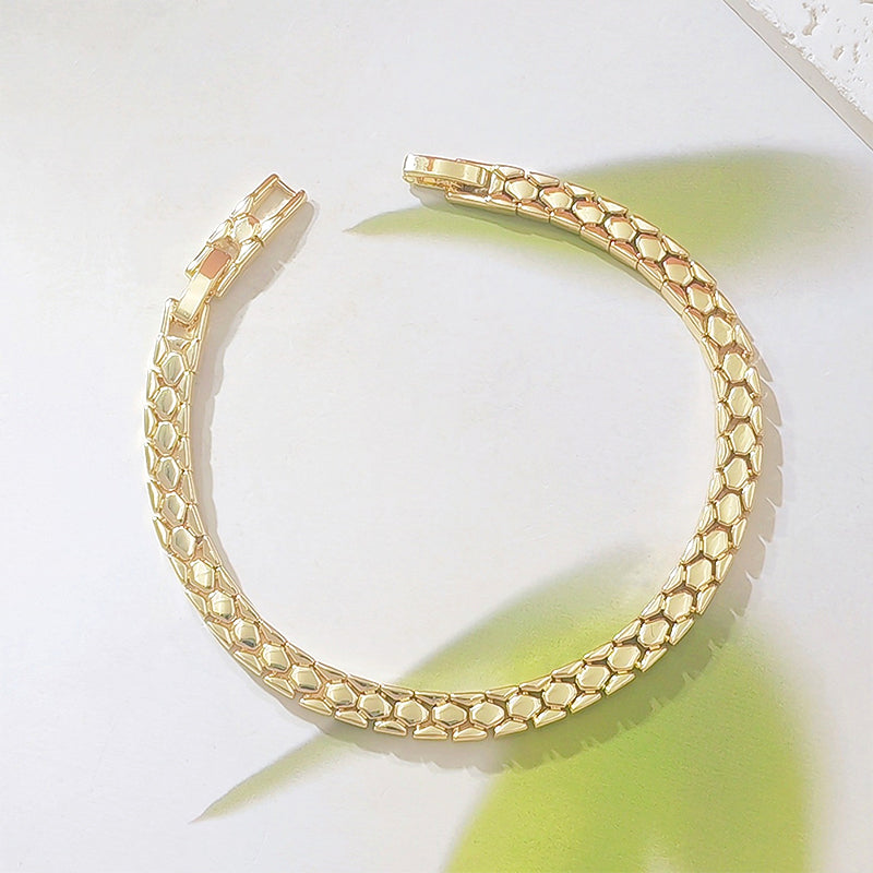 Goudkleurige ketting armband met slangenschubben patroon | LJ20548251