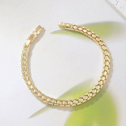 Goudkleurige ketting armband met slangenschubben patroon | LJ20548251